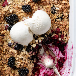 Summer Berry Crisp! Celebrate the flavors of summer with this Summer Berry Crisp using raspberries, blueberries and blackberries for a juicy berry filling nestled under a crispy, buttery, flavorful oat topping. It’s so good!