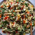 Summer Pasta Salad with a Dijon vinaigrette. So easy to make and delicious! Super versatile, use any short or small pasta, mix with the raw veggies of your choice and mix in the dressing and enjoy!