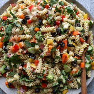 Summer Pasta Salad with a Dijon vinaigrette. So easy to make and delicious! Super versatile, use any short or small pasta, mix with the raw veggies of your choice and mix in the dressing and enjoy!