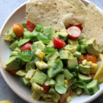 Delicious Avocado and Tomato Salad! Super easy to make and so flavorful! We'll definitely be eating this all summer long.