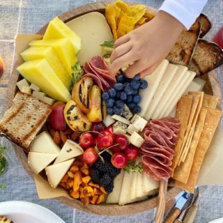 Summer Themed Cheese Board with Grilled Fruit! Celebrate summer with all of your favorite things! We love grilling bread, veggies and fruit! 