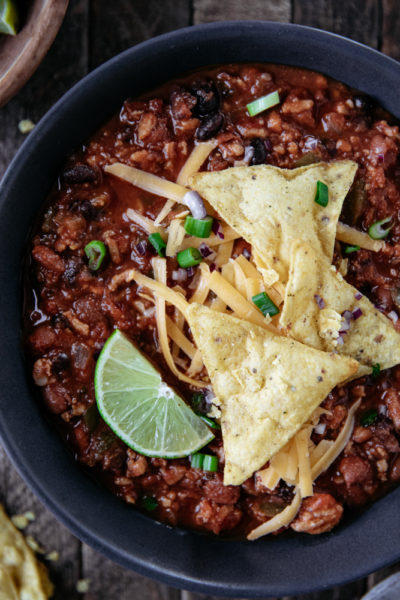 Instant Pot Beef Chili. Filled with ground beef, onions and three types of beans, this chili is sure to be a winner for dinner!