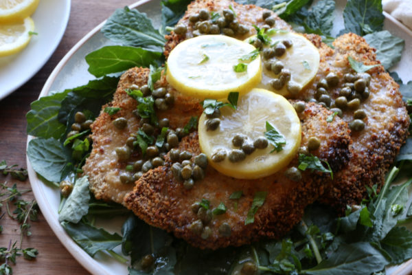 Air Fryer Pork Piccata using no oil at all! Crispy, flavorful and so delicious with a lemon butter caper sauce. It's so delicious!