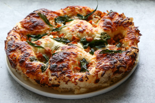 Roasted Honeynut Squash and Kale Pizza made with Food 52’s pizza crust. So incredibly delicious! You have to try it!