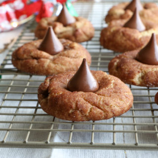 Cinnamon Peanut Butter Blossoms! The classic Peanut Butter Blossoms you love, dressed up for the holidays! You are going to love these!