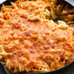 Creamy Baked Macaroni and Cheese! Starting with a milk-and-egg base, smoked paprika and more, and loaded delicious cheeses, this is the best!