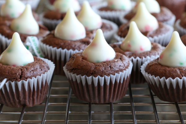 Double Chocolate Brownie Bites made with HERSHEY’S KISSES Sugar Cookie Candy!! Looking for a fun and delicious treat to make with your family for the holidays? You’ve got to try these!!