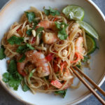 Peanut Noodles With Shrimp! A super easy and delicious Thai-inspired peanut noodles dish with shrimp, cabbage, bell peppers and carrots.