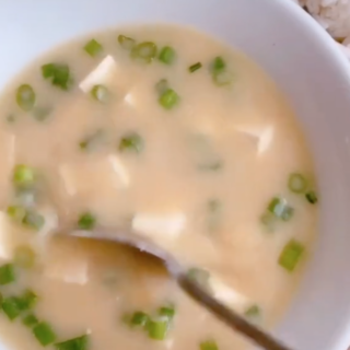 Quick and easy miso soup! This is not authentic at all - but a cheater, quick way to make one of my kids' favorites at home using chicken stock. 