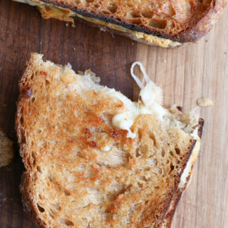 Air Fryer Grilled Cheese! A super easy and delicious, pretty much fool-proof way to make a crispy, golden brown grilled cheese sandwich. The air fryer does all the work for you. 