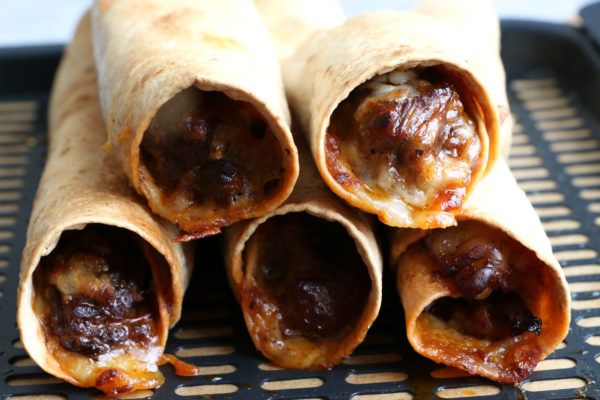 Pressure Cooker Shredded Beef! So easy to make! Use this delicious beef filling for rice bowls, taquitos, tacos and more!