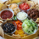 Build Your Own Taco Board! Just a fun way to spice up Taco Tuesdays! Serve everything on a board and let your family do the work.