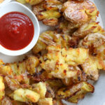 Crispy Smashed Potatoes!! Crunchy, golden brown exterior, with a soft and delicious inside. So easy to make, this might become your favorite way to enjoy potatoes! 