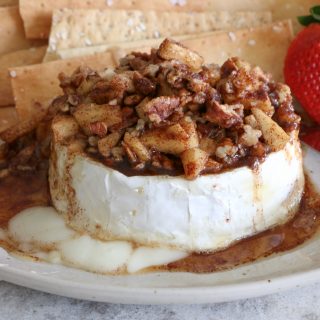 Baked Brie with Apples Cinnamon and Honey. Not just for the holidays, a baked brie is a lovely treat or appetizer to make! 