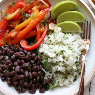 Black Beans and Cilantro Lime Rice! This is my ode to a Chipotle rice bowl. So easy to make and delicious! Make your own at home!