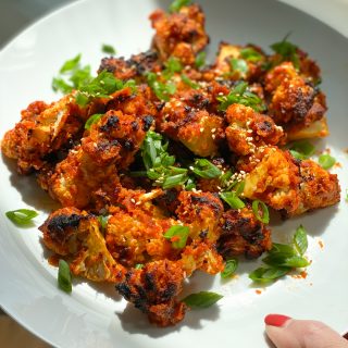 Korean Cauliflower. Spicy, flavorful and oh so delicious. Make these in the air fryer or the oven, we hope you try this!