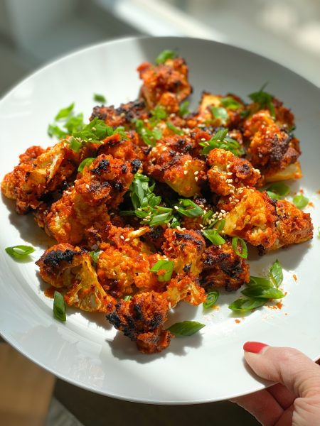 Korean Cauliflower. Spicy, flavorful and oh so delicious. Make these in the air fryer or the oven, we hope you try this!