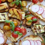 Summer Crostini with Truly Grass Fed butter and cheese! Toasted or grilled bread with aged cheddar, tomatoes, grilled zucchini and more!