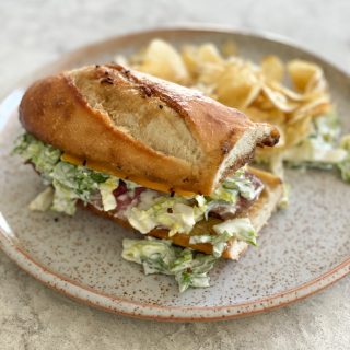 The Ultimate Steak Sandwich inspired by the Curtis Stone episode of Selena and Chef. I added a lettuce slaw like salad and cheddar cheese.