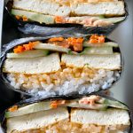 Tofu Veggie Onigirazu made with pan fried tofu, thin sliced cucumber, shredded carrots and spicy mayo. So easy to make and delicious! 
