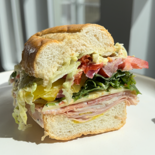 The Best Italian Hoagie!! Mortadella, salami, turkey with provolone, Giardiniera, banana peppers, pickled red onions, lettuce and more!