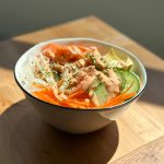 Spicy Salmon Poke Bowls! Diced raw fish served over rice with vegetable garnishes and spicy mayo. So delicious and easy to make! We hope you try this! 