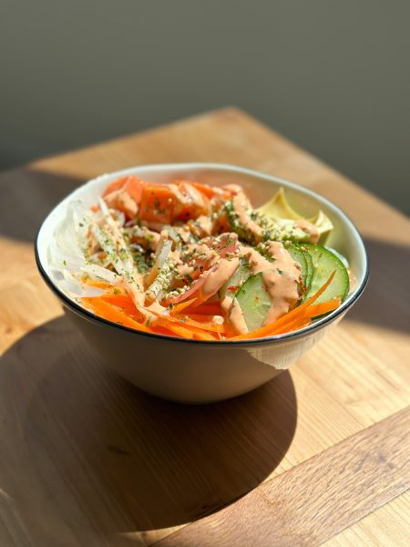 Spicy Salmon Poke Bowls! Diced raw fish served over rice with vegetable garnishes and spicy mayo. So delicious and easy to make! We hope you try this! 