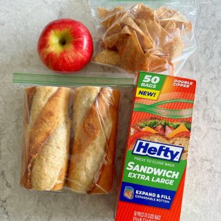 Jambon Beurre Sandwich! A French ham sandwich made of a fresh baguette sliced open, spread with butter and filled with slices of ham.