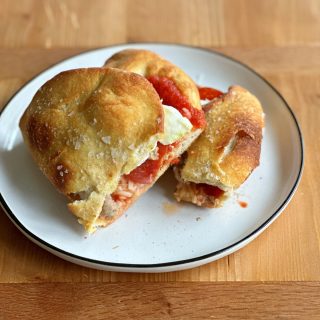 Pizza Sandwiches! So delicious to make if you have leftover pizza dough or store bought pizza dough! So great with pesto and arugula!