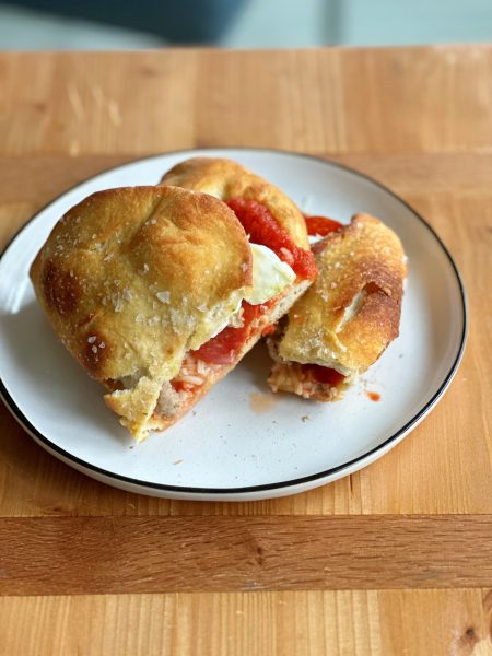 Pizza Sandwiches! So delicious to make if you have leftover pizza dough or store bought pizza dough! So great with pesto and arugula!