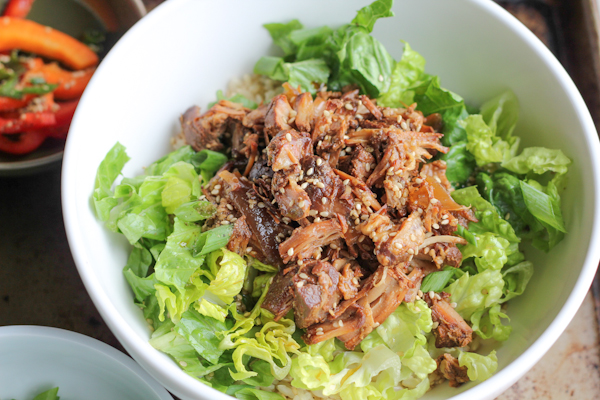 Instant Pot Pulled Pork! So easy and so delicious to make! Tender and so flavorful. Make a sandwich, taco or throw this in a bowl of rice.
