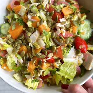 Roasted Butternut Squash Chopped Salad! Loaded with butternut squash, turkey, smoked gouda, lettuce, tomatoes, pickled red onions and more! It's so filling and delicious, I hope you try it!