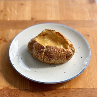 Jacket Potatoes with Miso Butter and Kimchi. Extra crispy exterior with a savory, fluffy and delicious center. Easy, delicious and filling!