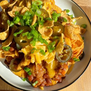 Sweet Potato Frito Pie!!! Or should I say loaded sweet potato frito pie!! Game day food at its finest. Sweet and savory with a kick!