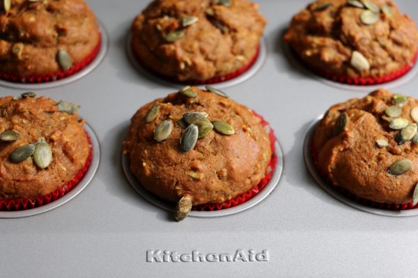Pumpkin Muffins! Delicious muffins with pepitas, pumpkin pie spice, cinnamon and more! Your house will be filled the aroma of fall!