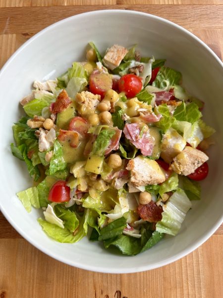 Jennifer Aniston Cobb Salad! Chicken, garbanzo beans, tomatoes, crispy bacon, what more could you ask for? It's delicious! 