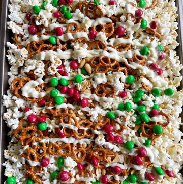 Holiday Popcorn Snack Mix and More! The perfect mix of sweet and savory! Popcorn, pretzels, M&M's, peanuts and white chocolate! So good!