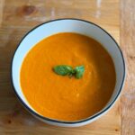 Roasted Tomato Soup made from roasting Roma and cherry tomatoes, onions, carrots and more! It's so rich in flavor and super simple to make!